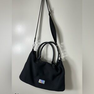 Sol and Selene Black‎ Perforated Messenger Bag